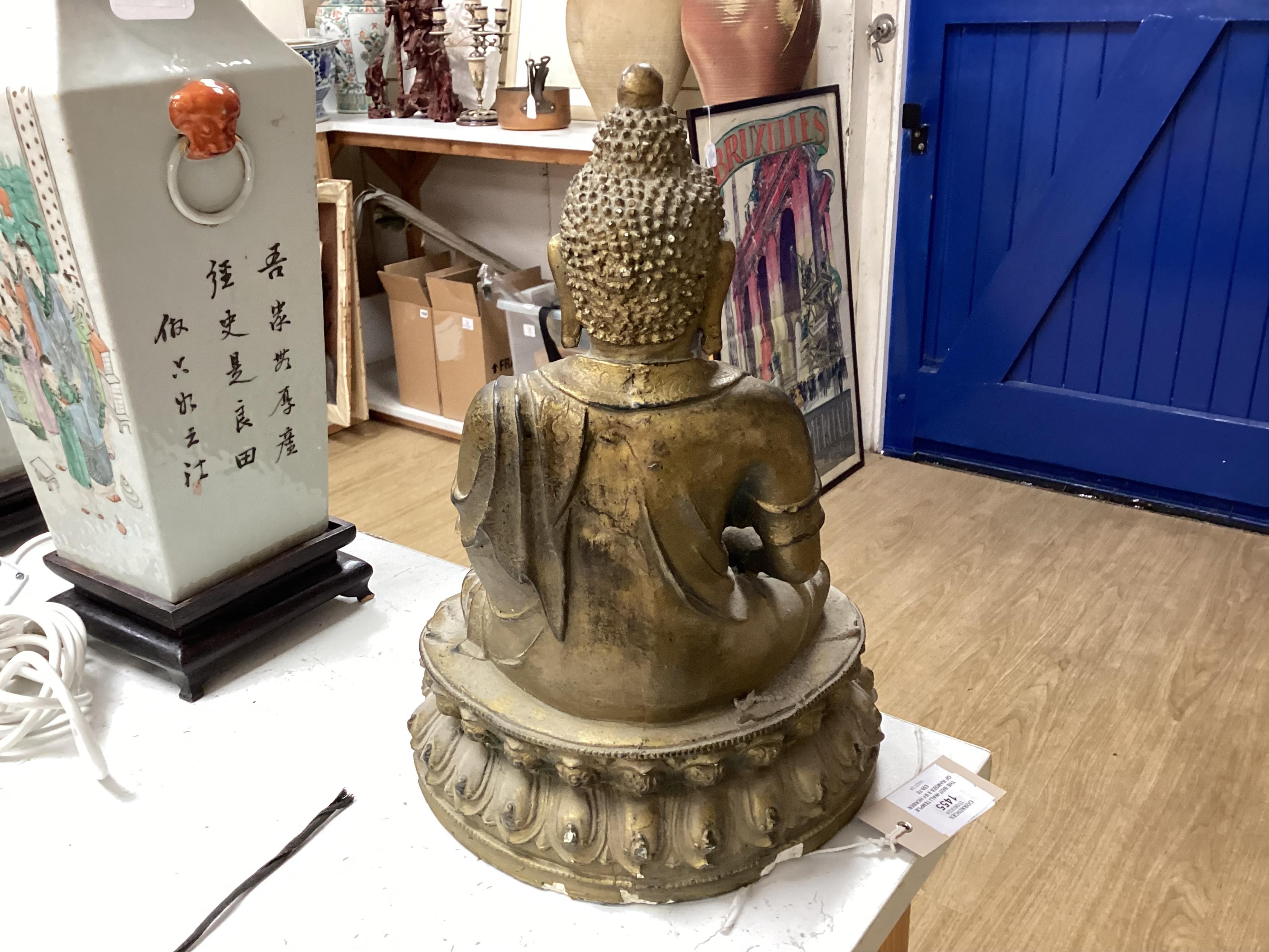 A pair of early 20th century Chinese famille rose vases, mounted as lamps and a plaster model of a Buddha, vases 46cm